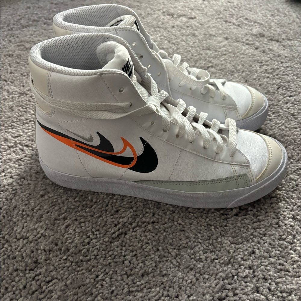 Nike Kids White Sneakers with Orange and Black Swoosh